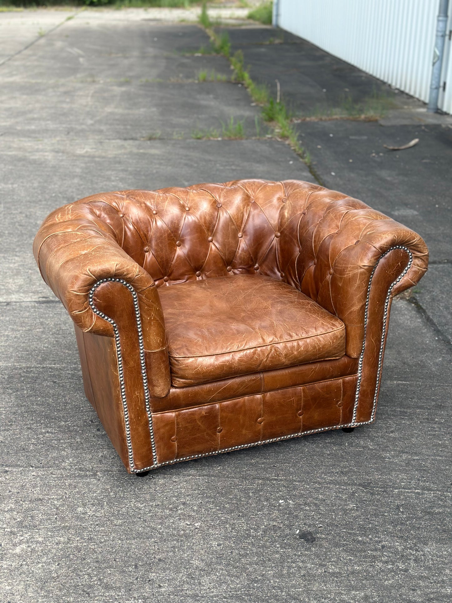 Fotel skórzany Chesterfield – Klasyczny uszak klubowy, brązowy